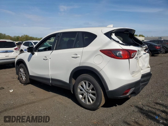 2015 Mazda CX-5 Touring with VIN JM3KE4CYXF0445980, listed as a Copart auction lot 55224355 with 183,713 mi miles and Salvage Title. Bid and sale history available at DreamBid. Image 2.