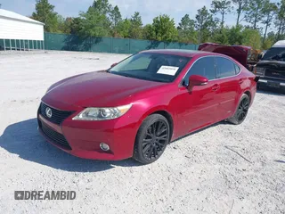 2014 Lexus ES 300h Hybrid with VIN JTHBW1GG4E2064553, listed as a IAAI auction lot 42002058 with 180,455 mi miles. Bid and sale history available at carsss.com. Image 18.