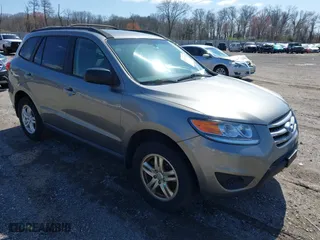 2012 Hyundai Santa Fe GLS with VIN 5XYZG3AB3CG101245, listed as a IAAI auction lot 41938369 with 191,385 mi miles. Bid and sale history available at carsss.com. Image 1.