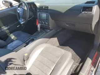 2014 Dodge Challenger R/T z VIN 2C3CDYBT6EH112199, wystawiony jako Copart lot #58023535 z przebiegiem 99 977 mil mil oraz Szkody całkowita. Historia ofert i sprzedaży dostępna na DreamBid. Obrazek 8.