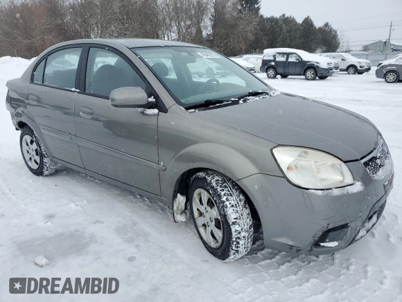 2010 Kia Rio with VIN KNADH4B33A6617736, listed as a Copart auction lot 45469215 with 233,539 mi miles and Clean Title. Bid and sale history available at DreamBid. Image 4.