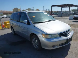 2004 Honda Odyssey EX z VIN 5FNRL18634B042781, wystawiony jako IAAI lot #42333139 z przebiegiem Nie podano mil oraz . Historia ofert i sprzedaży dostępna na DreamBid. Obrazek 1.