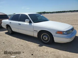 1995 Ford Crown Victoria z VIN 2FALP73W7SX158296, wystawiony jako Copart lot #56706735 z przebiegiem 104 884 mil mil oraz Czysty tytuł • Clean title. Historia ofert i sprzedaży dostępna na DreamBid. Obrazek 4.
