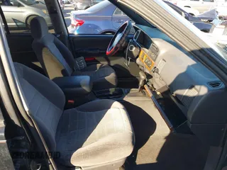 1998 Jeep Grand Cherokee Laredo with VIN 1J4FX58S8WC121904, listed as a IAAI auction lot 41145207 with 222,134 mi miles. Bid and sale history available at carsss.com. Image 5.
