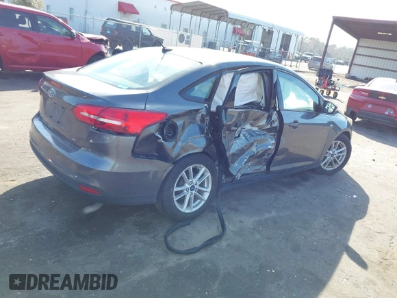 2017 Ford Focus SE with VIN 1FADP3F2XHL312253, listed as a IAAI auction lot 41480167 with 86,459 mi miles. Bid and sale history available at carsss.com. Image 4.