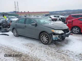 2014 Toyota Camry L with VIN 4T1BF1FK5EU774116, listed as a IAAI auction lot 41286569 with 184,797 mi miles. Bid and sale history available at carsss.com. Image 1.