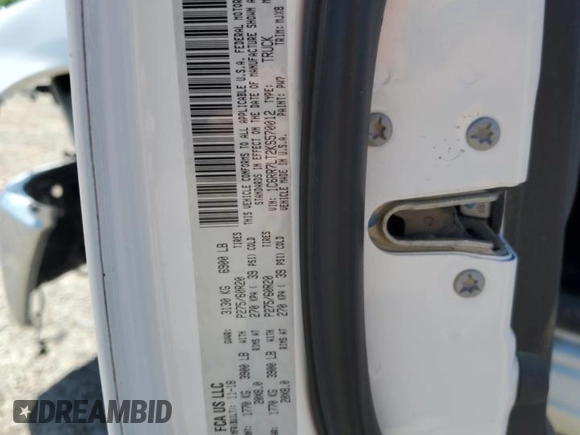 2019 Ram 1500 Big Horn with VIN 1C6RR7LT2KS570012, listed as a Copart auction lot 52257055 with 62,526 mi miles and Salvage title. Bid and sale history available at DreamBid. Image 14.