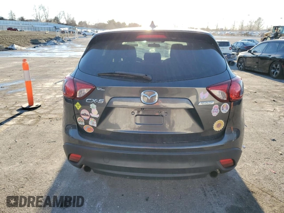 2015 Mazda CX-5 Touring with VIN JM3KE2CY0F0439125, listed as a Copart auction lot 43324945 with 210,404 mi miles and Clean Title. Bid and sale history available at DreamBid. Image 6.