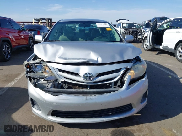 2011 Toyota Corolla L with VIN 2T1BU4EE7BC566402, listed as a IAAI auction lot 41970006 with 244,127 mi miles. Bid and sale history available at carsss.com. Image 12.