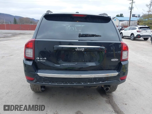 2016 Jeep Compass Latitude with VIN 1C4NJDEB8GD695268, listed as a IAAI auction lot 41724921 with 137,118 mi miles. Bid and sale history available at carsss.com. Image 6.