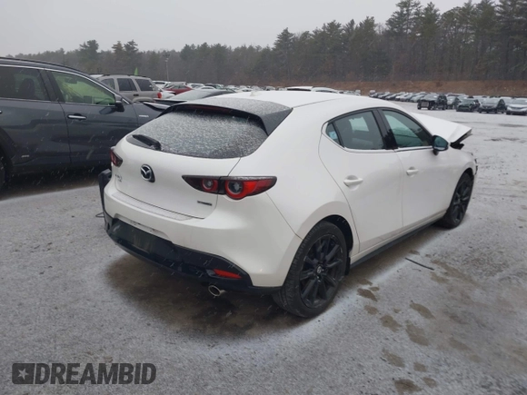 2022 Mazda Mazda3 Hatchback Premium with VIN JM1BPBML5N1501410, listed as a IAAI auction lot 41148682 with 8,541 mi miles. Bid and sale history available at carsss.com. Image 4.