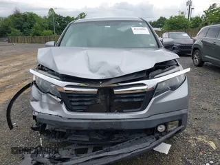 2017 Honda Ridgeline RTL with VIN 5FPYK3F52HB019266, listed as a IAAI auction lot 42638081 with 117,004 mi miles and . Bid and sale history available at DreamBid. Image 12.