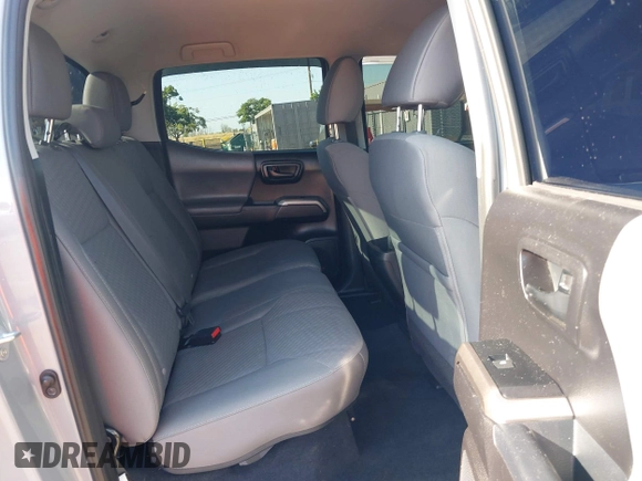 2021 Toyota Tacoma SR5 with VIN 5TFAZ5CN7MX101810, listed as a IAAI auction lot 42454418 with 58,930 mi miles and . Bid and sale history available at DreamBid. Image 8.
