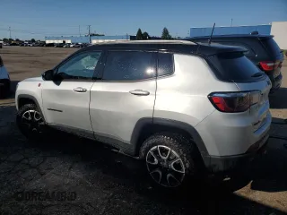 2025 Jeep Compass Trailhawk with VIN 3C4NJDDN0ST564544, listed as a Copart auction lot 63287955 with 7,390 mi miles and Clean title. Bid and sale history available at DreamBid. Image 2.