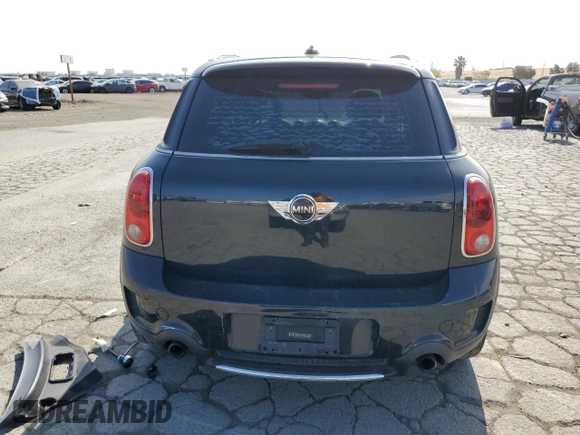 2012 MINI Countryman S z VIN WMWZC3C58CWL85765, wystawiony jako Copart lot #55291025 z przebiegiem 188 894 mil mil oraz Szkody całkowita. Historia ofert i sprzedaży dostępna na DreamBid. Obrazek 6.