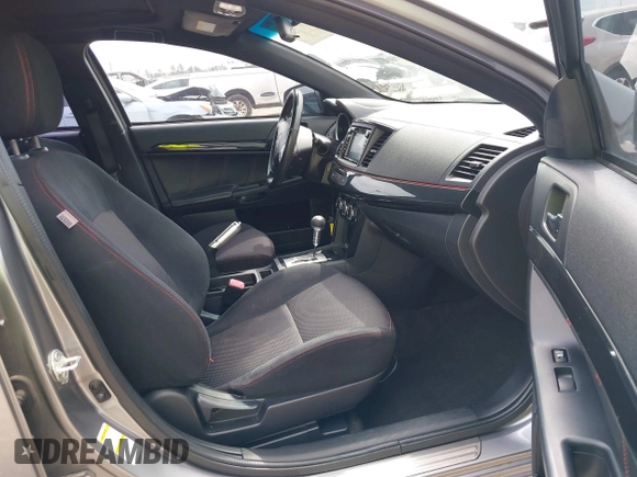 2017 Mitsubishi Lancer ES with VIN JA32U2FUXHU013182, listed as a IAAI auction lot 41894469 with 108,796 mi miles and . Bid and sale history available at DreamBid. Image 5.