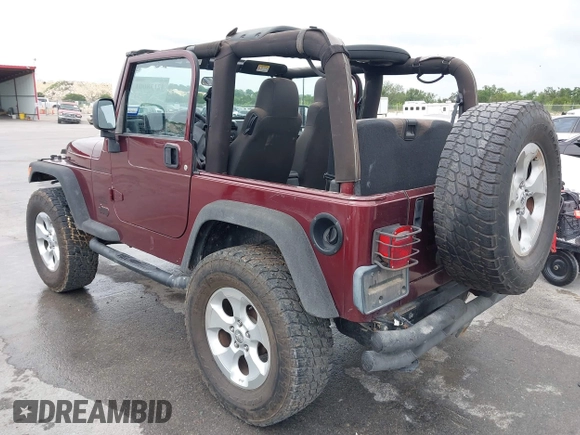 2003 Jeep Wrangler Sport with VIN 1J4FA49S63P324904, listed as a IAAI auction lot 42138001 with 170,917 mi miles and . Bid and sale history available at DreamBid. Image 3.