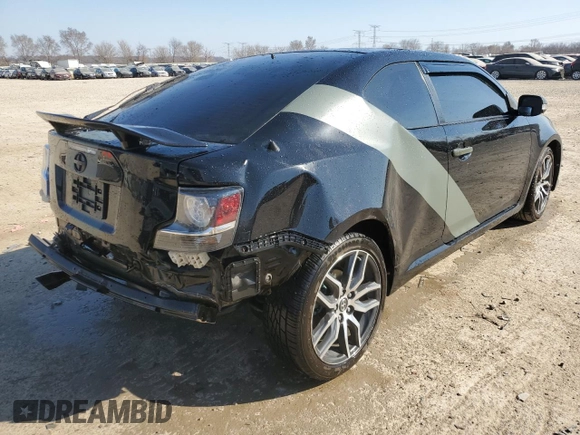 2016 Scion tC z VIN JTKJF5C79GJ014274, wystawiony jako Copart lot #49000685 z przebiegiem 83 607 mil mil oraz Szkoda całkowita • Salvage title. Historia ofert i sprzedaży dostępna na DreamBid. Obrazek 3.