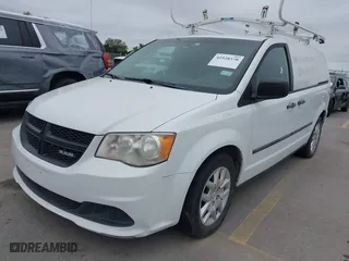 2014 Ram Cargo Van Tradesman with VIN 2C4JRGAG9ER406306, listed as a IAAI auction lot 41928370 with 174,352 mi miles. Bid and sale history available at carsss.com. Image 2.