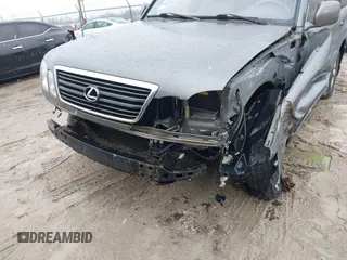 2000 Lexus LX 470 z VIN JT6HT00W8Y0092556, wystawiony jako IAAI lot #41727615 z przebiegiem 156 262 mil mil oraz . Historia ofert i sprzedaży dostępna na DreamBid. Obrazek 12.