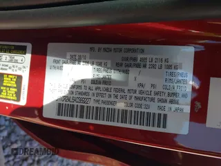 2010 Mazda 5 Sport with VIN JM1CR2WL6A0389227, listed as a IAAI auction lot 42031801 with 100,652 mi miles. Bid and sale history available at carsss.com. Image 9.