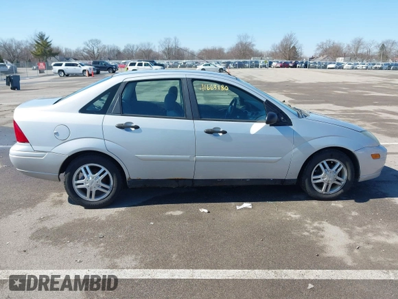 2004 Ford Focus SE with VIN 1FAFP34394W120884, listed as a IAAI auction lot 41663180 with 213,972 mi miles and . Bid and sale history available at DreamBid. Image 13.