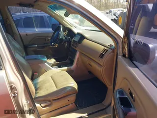 2003 Honda Pilot EX with VIN 2HKYF18613H527391, listed as a IAAI auction lot 41973453 with 253,652 mi miles. Bid and sale history available at carsss.com. Image 5.