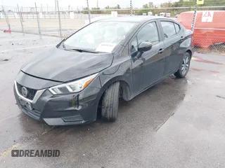 2021 Nissan Versa SV with VIN 3N1CN8EV9ML890544, listed as a IAAI auction lot 40990763 with 83,944 mi miles. Bid and sale history available at carsss.com. Image 2.