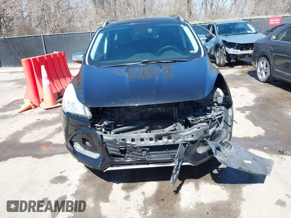 2014 Ford Escape Titanium with VIN 1FMCU0JX1EUE12260, listed as a IAAI auction lot 41826246 with 178,532 mi miles. Bid and sale history available at carsss.com. Image 6.