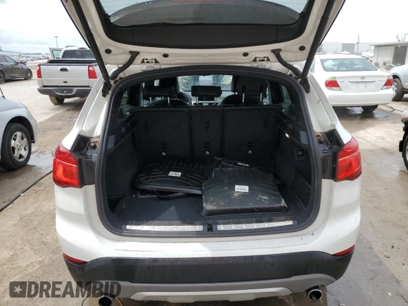2019 BMW X1 sDrive28i with VIN WBXHU7C57K5L10243, listed as a Copart auction lot 48959423 with 42,248 mi miles and . Bid and sale history available at DreamBid. Image 6.
