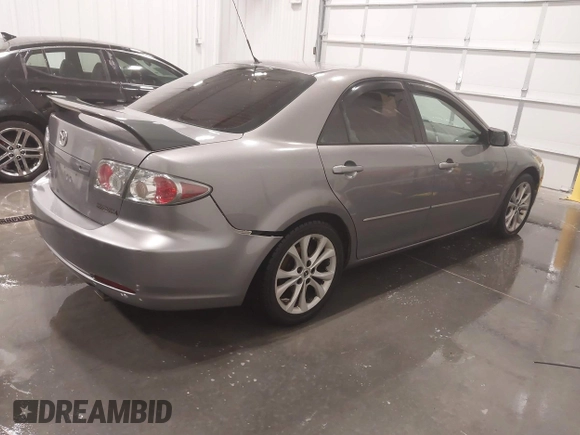 2006 Mazda 6 i with VIN 1YVFP80C865M23087, listed as a IAAI auction lot 41412551 with 148,395 mi miles and . Bid and sale history available at carsss.com. Image 4.