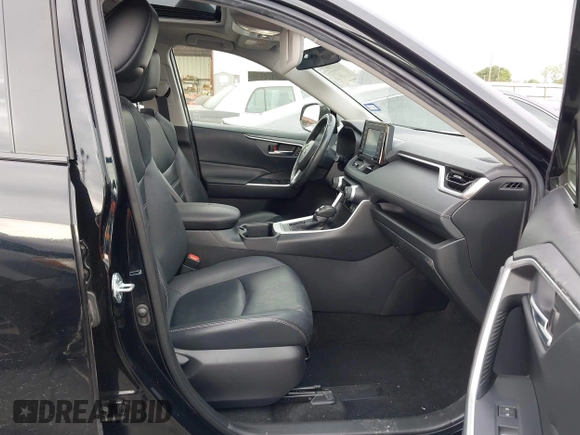 2022 Toyota RAV4 XLE Premium with VIN JTMC1RFV0ND085813, listed as a IAAI auction lot 42152401 with 86,707 mi miles and . Bid and sale history available at DreamBid. Image 5.