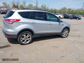 2013 Ford Escape SEL with VIN 1FMCU9HX5DUC09591, listed as a IAAI auction lot 42074088 with 131,554 mi miles. Bid and sale history available at carsss.com. Image 4.