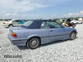 1997 BMW 3-Series 328IC with VIN WBABK832XVET96413, listed as a Copart auction lot 47806025 with 66,051 mi miles and Salvage Title. Bid and sale history available at carsss.com. Image 3.