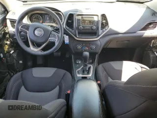 2015 Jeep Cherokee Sport with VIN 1C4PJMAB9FW545249, listed as a Copart auction lot 57528075 with 158,074 mi miles and Salvage title. Bid and sale history available at DreamBid. Image 8.