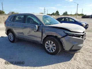 2024 Honda CR-V LX with VIN 2HKRS3H27RH317587, listed as a Copart auction lot 82719674 with 13,509 mi miles and Salvage Title. Bid and sale history available at DreamBid. Image 4.