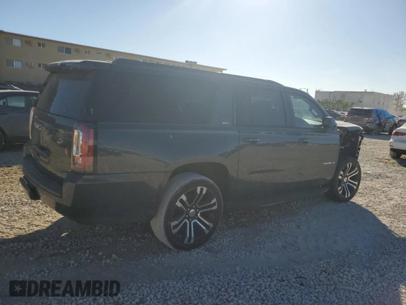 2019 GMC Yukon XL SLT with VIN 1GKS1GKCXKR325814, listed as a Copart auction lot 82221454 with 65,803 mi miles and Salvage Title. Bid and sale history available at carsss.com. Image 3.