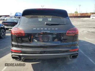 2017 Porsche Cayenne with VIN WP1AA2A20HKA80640, listed as a Copart auction lot 61038585 with 60,893 mi miles and Salvage title. Bid and sale history available at DreamBid. Image 6.