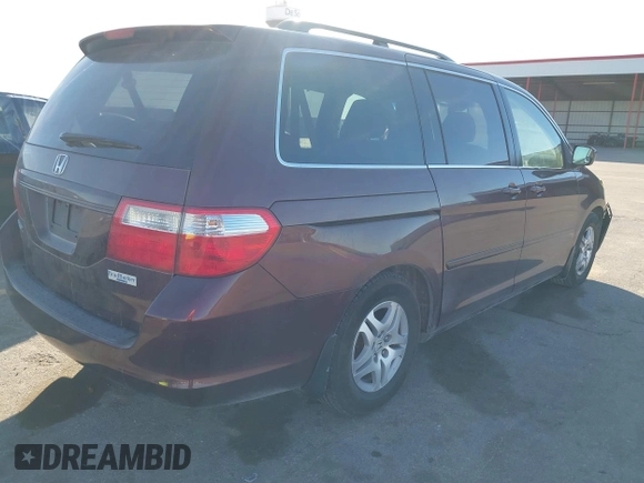 2007 Honda Odyssey EX-L with VIN 5FNRL38697B460066, listed as a IAAI auction lot 41453305 with 169,008 mi miles. Bid and sale history available at carsss.com. Image 4.
