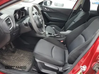 2014 Mazda 3 i SV with VIN JM1BM1T74E1148567, listed as a Copart auction lot 50977115 with 85,792 mi miles and Salvage Title. Bid and sale history available at DreamBid. Image 7.