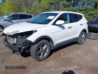 2018 Hyundai Santa Fe 2.4L z VIN 5NMZTDLB3JH090748, wystawiony jako IAAI lot #42145245 z przebiegiem 112 314 mil mil oraz . Historia ofert i sprzedaży dostępna na DreamBid. Obrazek 2.