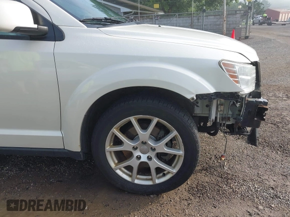 2013 Dodge Journey Crew with VIN 3C4PDCDG0DT591533, listed as a IAAI auction lot 42630548 with 164,961 mi miles and . Bid and sale history available at DreamBid. Image 17.