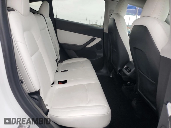 2021 Tesla Model Y Long Range with VIN 5YJYGDEEXMF151686, listed as a Copart auction lot 53903115 with 65,321 mi miles and Salvage Title. Bid and sale history available at DreamBid. Image 11.