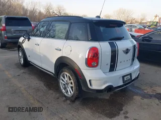 2015 MINI Cooper Countryman S with VIN WMWZC5C50FWP42324, listed as a IAAI auction lot 41795698 with 95,746 mi miles. Bid and sale history available at carsss.com. Image 3.