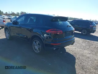 2016 Porsche Cayenne with VIN WP1AA2A21GLA02456, listed as a IAAI auction lot 41309026 with 136,266 mi miles. Bid and sale history available at carsss.com. Image 3.