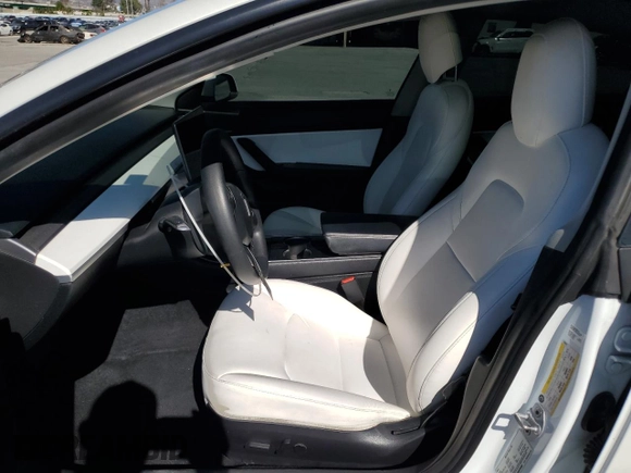 2019 Tesla Model 3 Mid Range with VIN 5YJ3E1EA6KF509987, listed as a Copart auction lot 46117565 with 64,042 mi miles and Salvage Title. Bid and sale history available at carsss.com. Image 7.