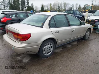 2002 Saturn SL with VIN 1G8ZK52732Z274875, listed as a IAAI auction lot 41911548 with 266,181 mi miles. Bid and sale history available at carsss.com. Image 4.