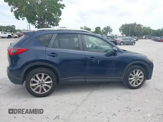 2014 Mazda CX-5 Grand Touring with VIN JM3KE2DY8E0425258, listed as a IAAI auction lot 42179452 with 132,137 mi miles. Bid and sale history available at carsss.com. Image 13.