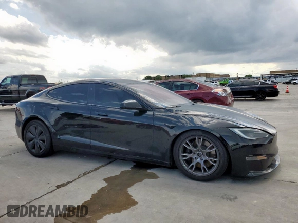 2022 Tesla Model S с VIN 5YJSA1E50NF492117, выставлен на аукционе Copart как лот 54307855 с пробегом 42 940 миль миль и Списание • Salvage title. История ставок и продаж доступна на DreamBid. Изображение 4.