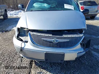 2001 Chrysler Town & Country with VIN 2C8GP44301R304800, listed as a IAAI auction lot 41433836 with Not Provided miles and . Bid and sale history available at DreamBid. Image 13.